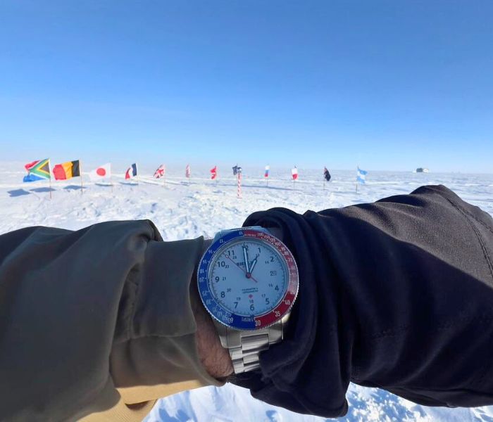 MEDIC watch field testing Antarctica country flags background