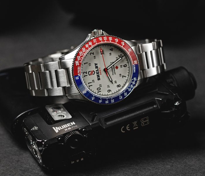 MEDIC Watch on top of old camera