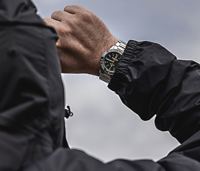 Man braving storm wearing Shelby Watch Co. MEDIC